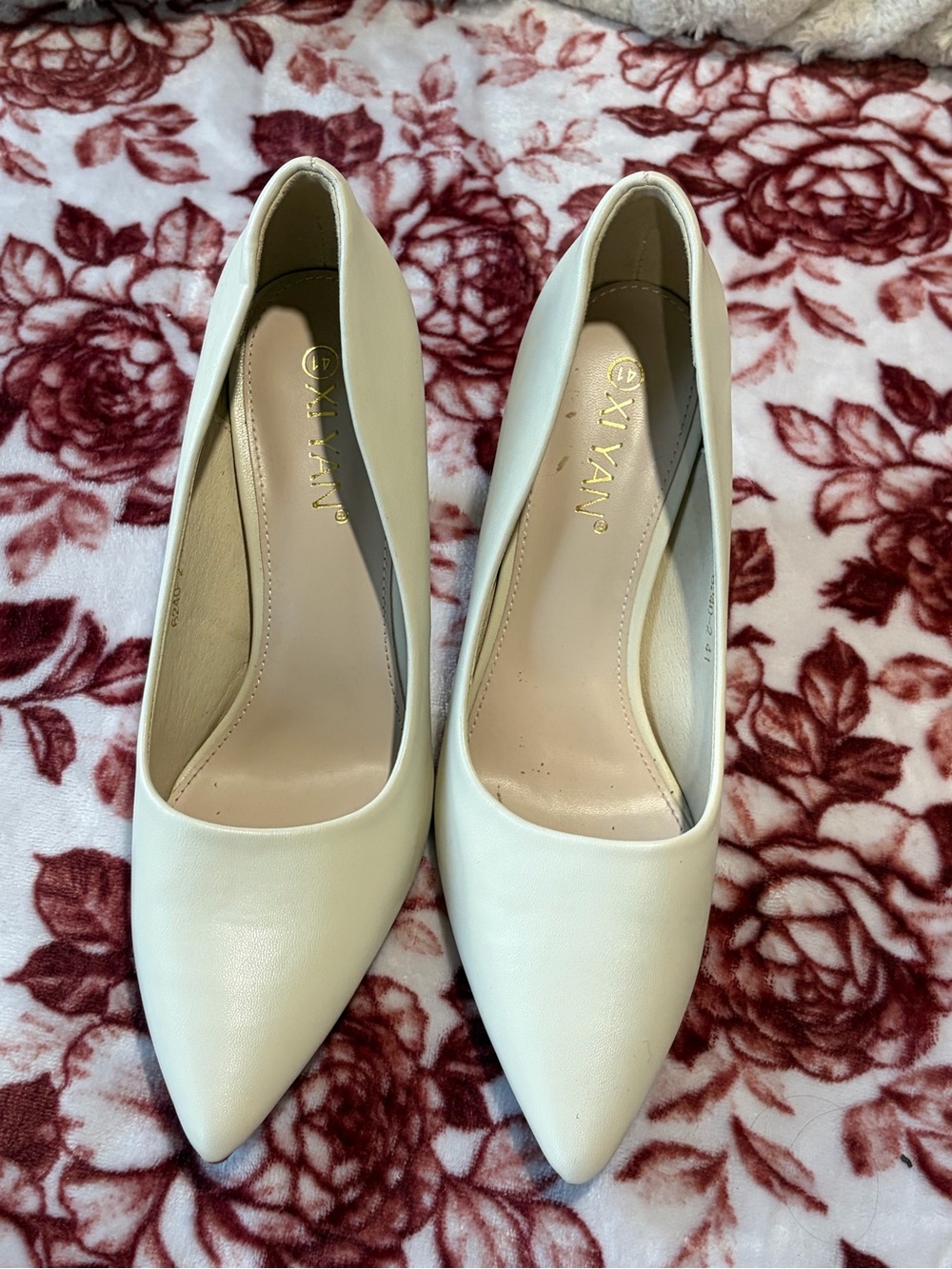 Women's Ivory Pointed-Toe Pumps by